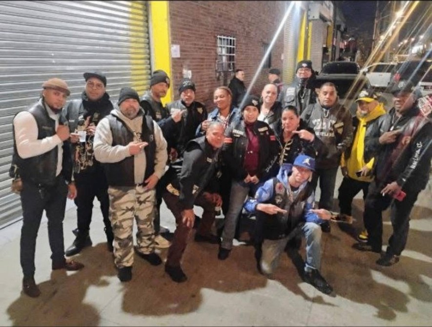 Chapter group shot after a night ride · Long Island